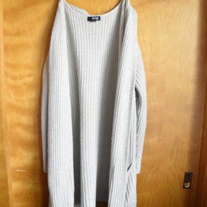 ANA light tan cardigan. Size-L with pockets.